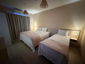 Deluxe Room, Garden View | In-room safe, blackout drapes, free WiFi