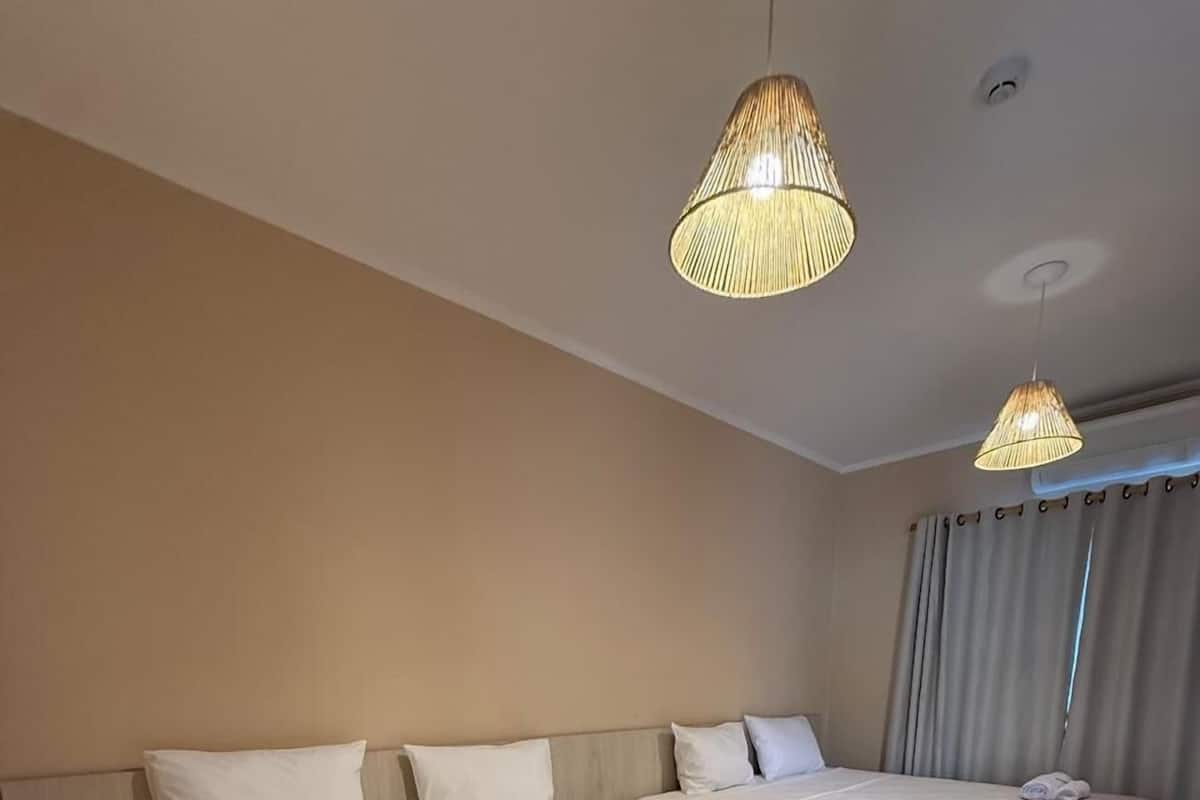 Deluxe Room, Garden View | In-room safe, blackout drapes, free WiFi