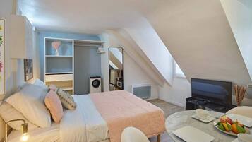 Apartment | Laptop workspace, iron/ironing board, bed sheets