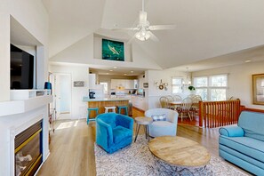 Smart-tv, een open haard en tafelvoetbal