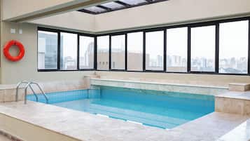Outdoor pool, open 6:00 AM to 10:00 PM, pool umbrellas, pool loungers