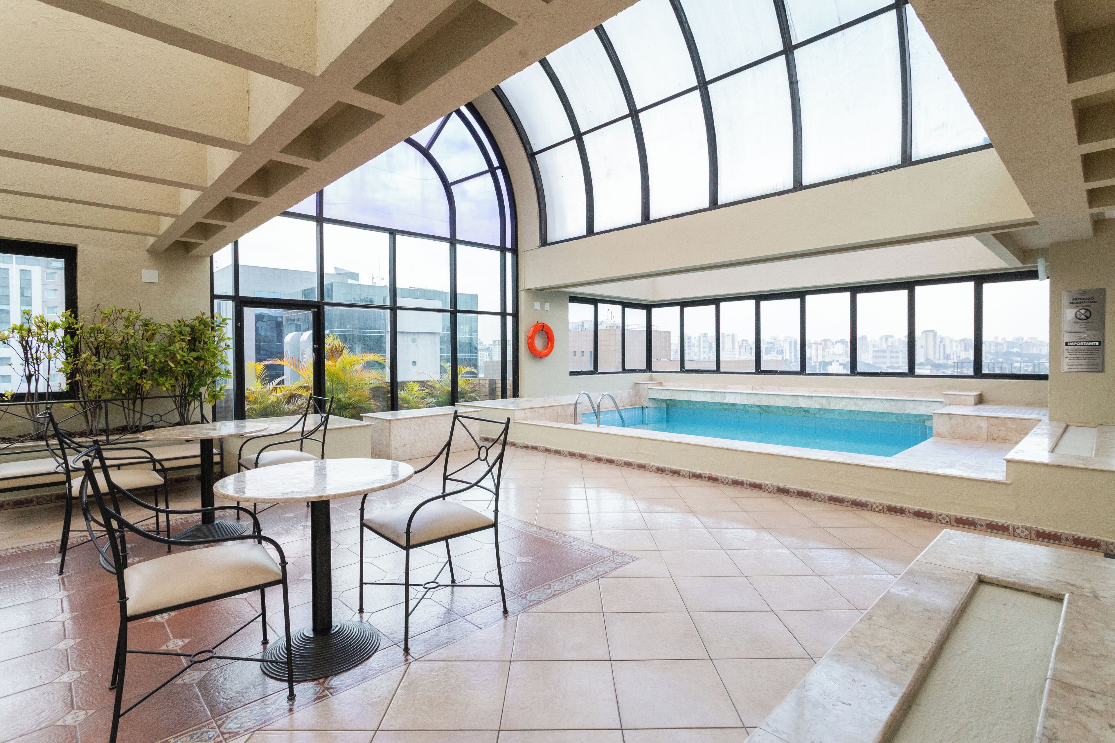 Outdoor pool, open 6:00 AM to 10:00 PM, pool umbrellas, sun loungers