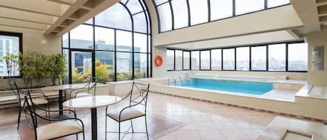 Outdoor pool, open 6:00 AM to 10:00 PM, pool umbrellas, pool loungers