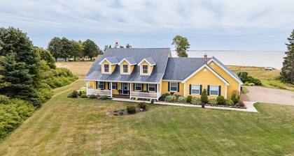 Yellow Beach House: Oceanfront PEI Retreat with Screened Porch & Beach Access