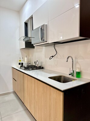Fridge, microwave, oven, stovetop