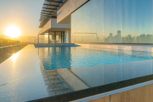 “Comfort & Style at Galería 360 – Pool and Gym”