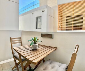 Outdoor dining - “Comfort & Style at Galería 360 – Pool and Gym” (Santo Domingo)