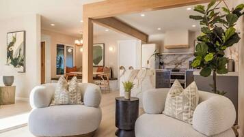 43-inch flat-screen TV with cable channels, fireplace, table football