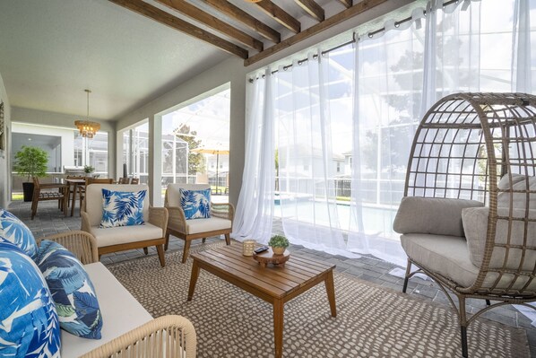 Outdoor dining - EV_9036 - 8 Bed 5 Bath Villa with Screened-In Private Pool, Custom Kids Bedroom (Davenport)