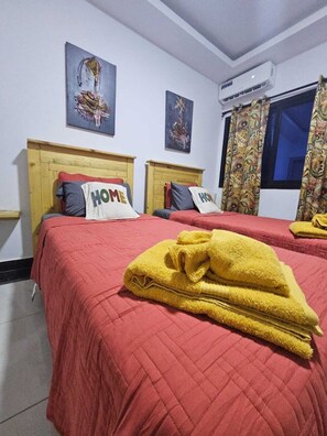 1 habitación, tabla de planchar con plancha, internet y ropa de cama 