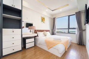 Deluxe Apartment, 3 Bedrooms, Balcony, City View | Minibar, desk, laptop workspace, free WiFi