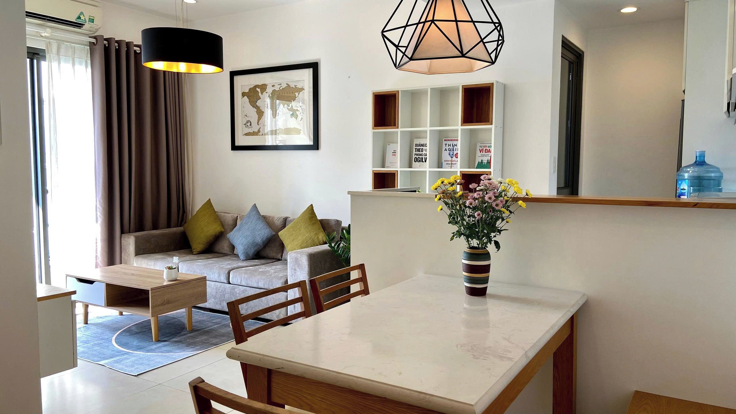 Deluxe Apartment, 2 Bedrooms, Balcony, City View | Living area | 55-inch flat-screen TV with cable channels, Netflix, streaming services