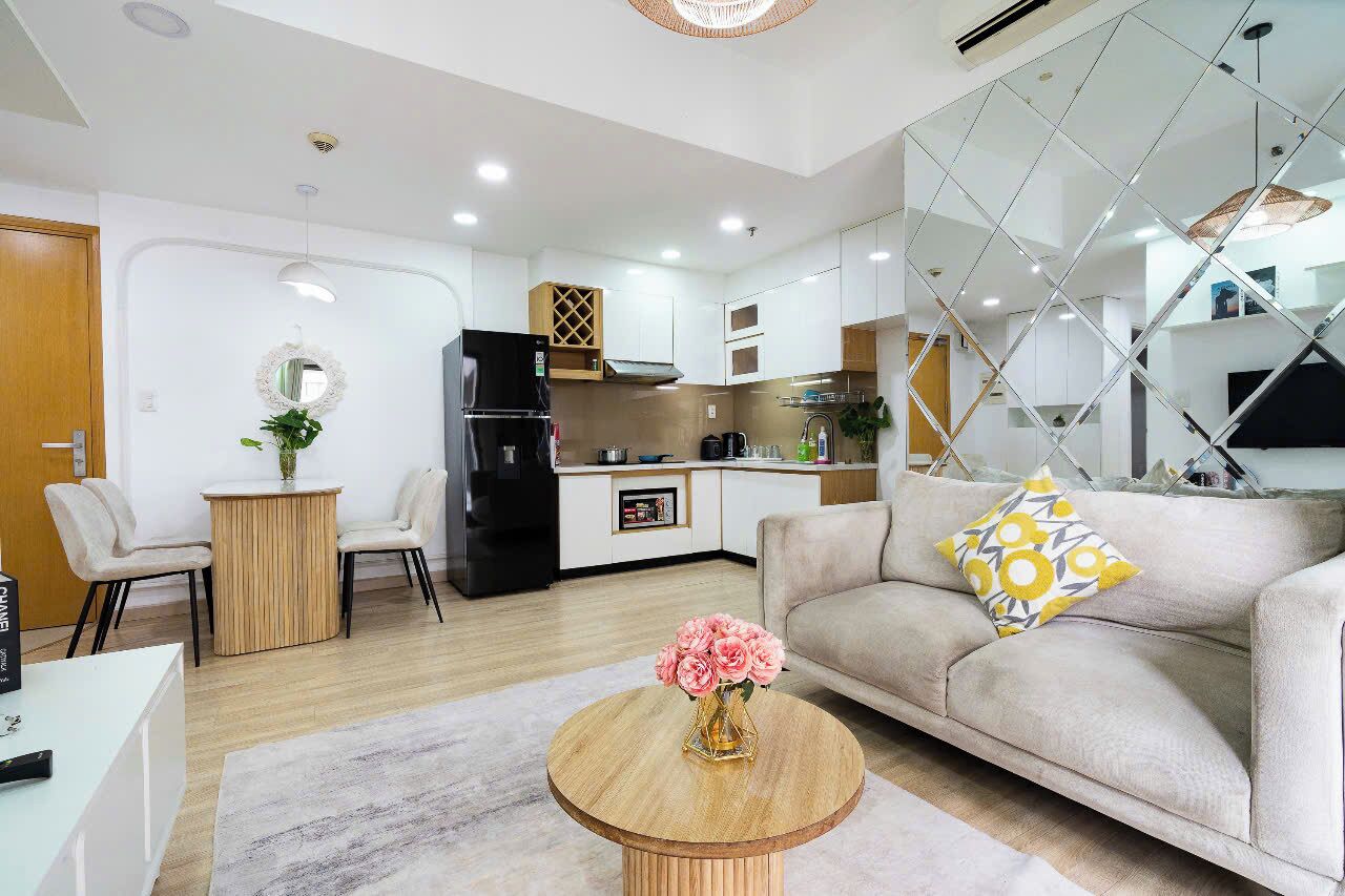 Deluxe Apartment, 2 Bedrooms, Balcony, City View | Living area | 55-inch flat-screen TV with cable channels, Netflix, streaming services