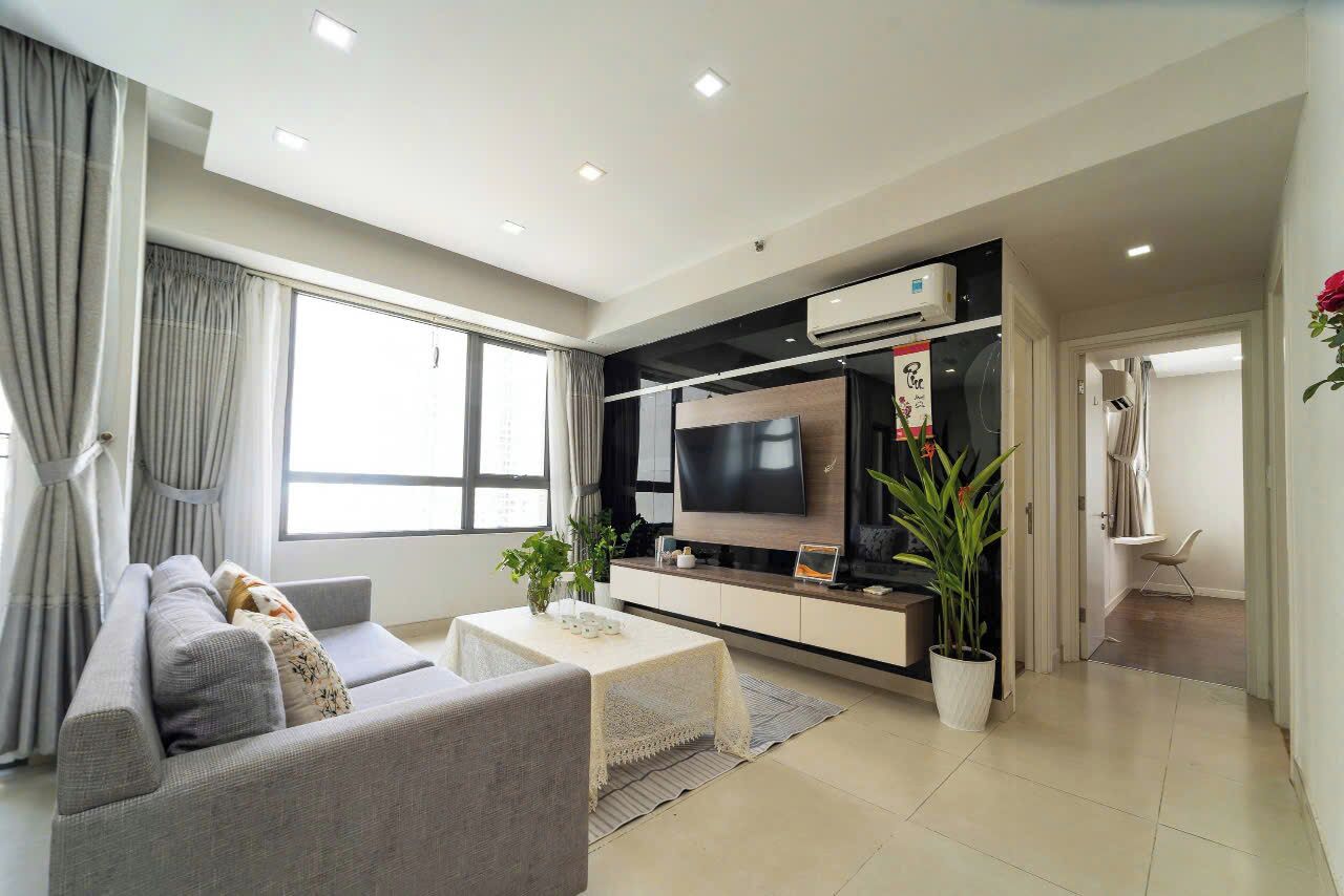 Deluxe Apartment, 2 Bedrooms, Balcony, City View | Living room | 55-inch flat-screen TV with cable channels, Netflix, streaming services