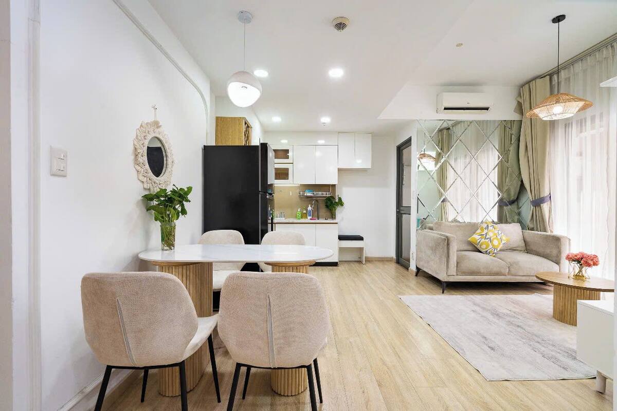 Deluxe Apartment, 2 Bedrooms, Balcony, City View | Living area | 55-inch flat-screen TV with cable channels, Netflix, streaming services