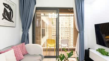 55-inch flat-screen TV with cable channels, Netflix, streaming services