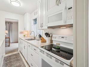 Microwave, dishwasher, cookware/dishes/utensils