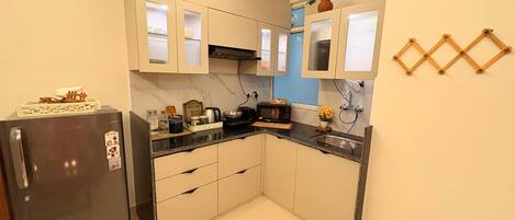 Fridge, microwave, stovetop, electric kettle