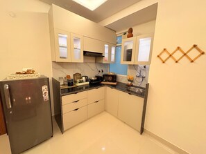 Fridge, microwave, stovetop, electric kettle