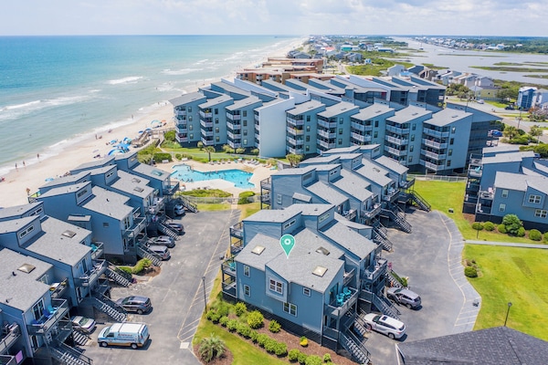 Ocean views from all angles at the end unit townhome, beach and pool steps away!