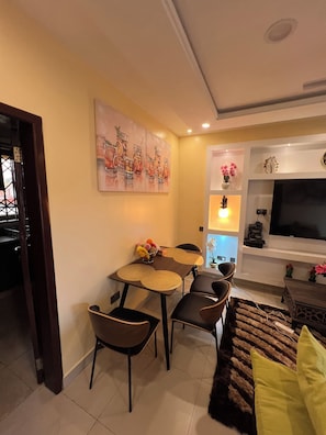 Standard Apartment, 2 Bedrooms | Living area | Flat-screen TV