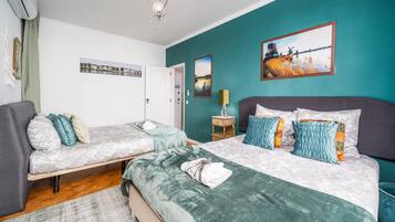 4 habitaciones, tabla de planchar con plancha, wifi y ropa de cama