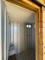 Shower, rainfall showerhead, towels, soap