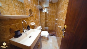 Shower, hair dryer, slippers, towels