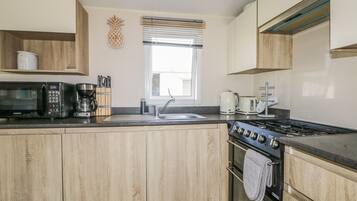 Fridge, toaster, cookware/dishes/utensils