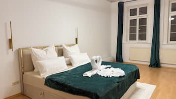 3 habitaciones, tabla de planchar con plancha, wifi y ropa de cama