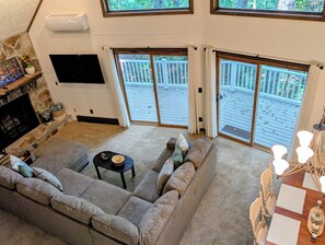 TV, fireplace, books