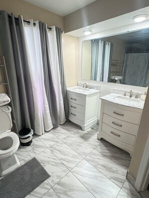 Hair dryer, towels, soap, toilet paper
