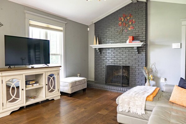 Smart TV, fireplace, books