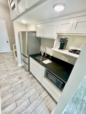 Fridge, microwave, electric kettle, toaster