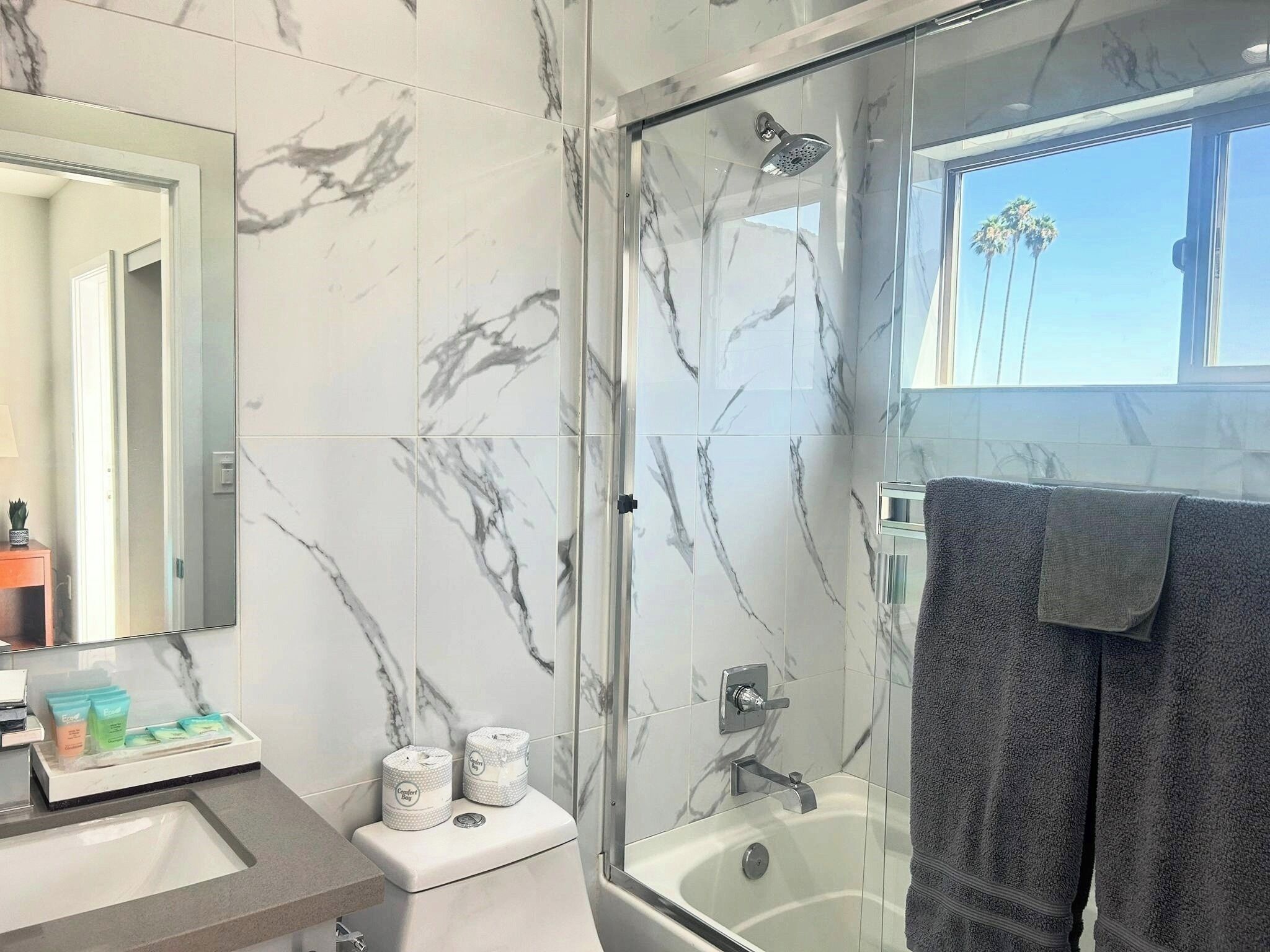 Shower, hair dryer, towels, soap