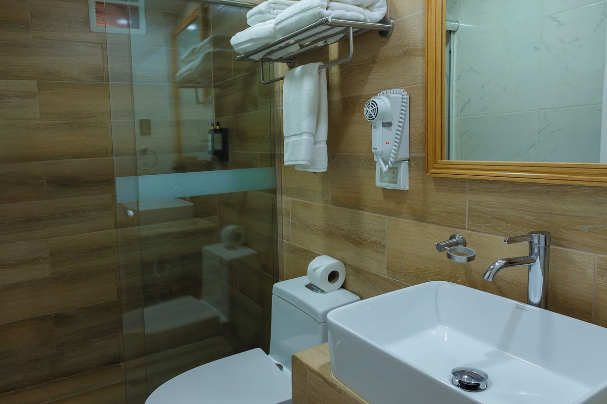 Shower, towels, soap, shampoo