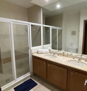 Shower, hair dryer, towels, soap