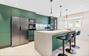 Fridge, microwave, dishwasher, coffee/tea maker