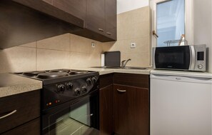 Refrigerador, horno, placa de cocina, cafetera/tetera