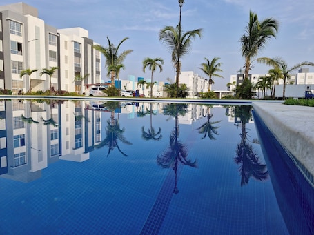 Outdoor pool. Nice first floor apartment