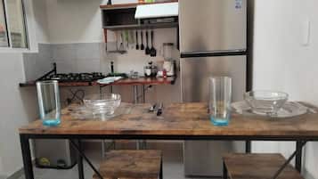 Fridge, microwave, stovetop, cookware/dishes/utensils