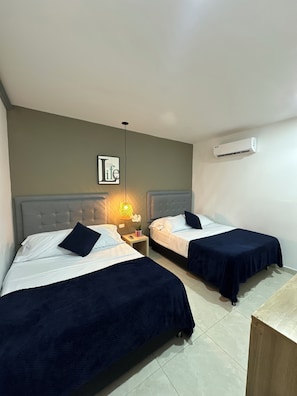 Familie appartement, uitzicht op stad | Een strijkplank/strijkijzer, gratis wifi