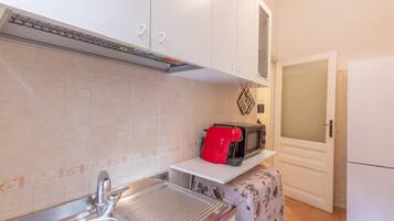 Microondas, horno y parrilla de estufa