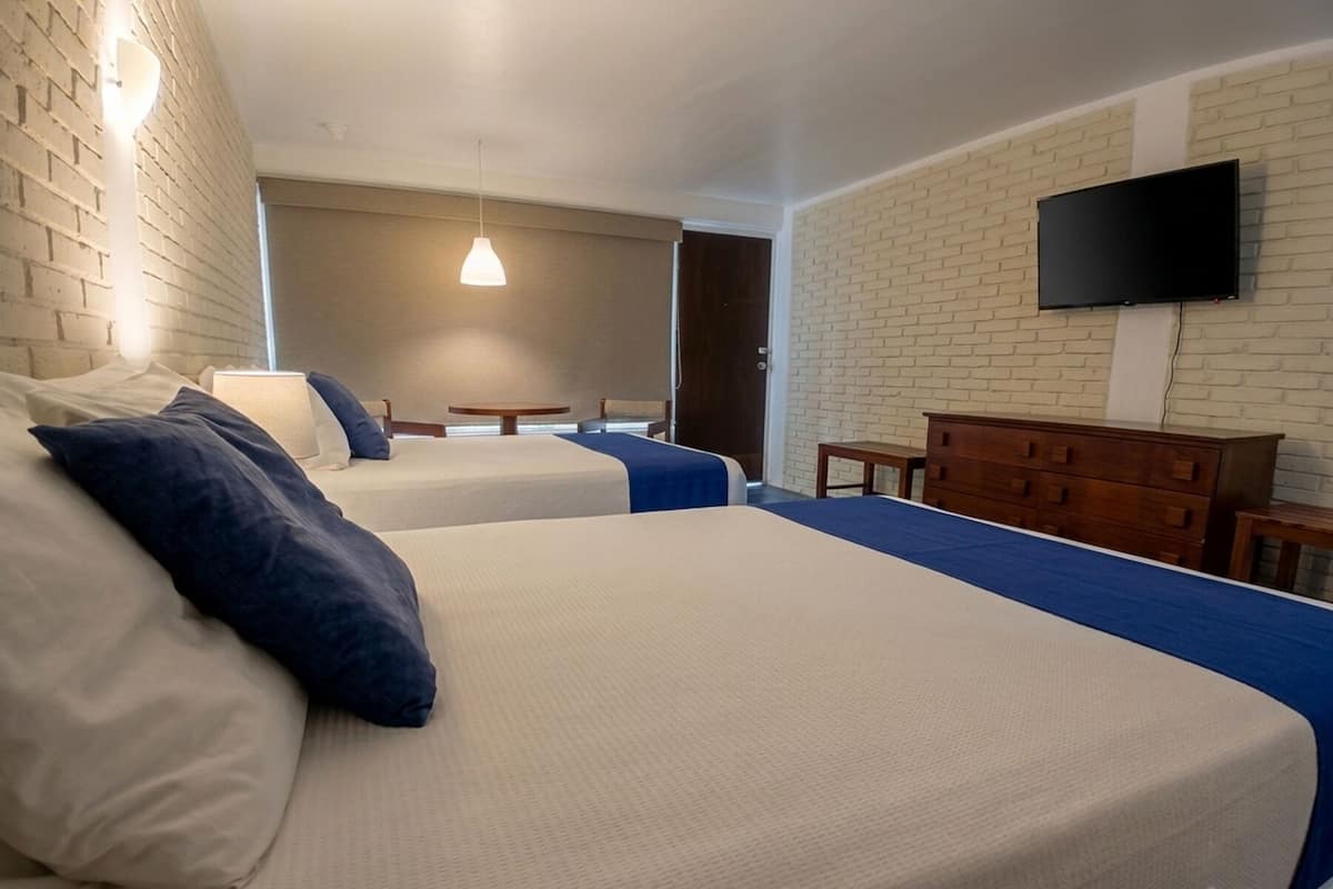 Chambre Double Confort, patio, vue piscine | Coffres-forts dans les chambres