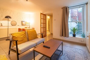 Appartement, 1 chambre | Salle de séjour