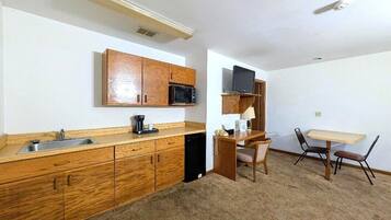 Premium Double Room | Private kitchen | Mini-fridge, microwave, coffee/tea maker