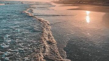 On the beach, sun loungers