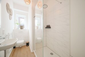 Shower, free toiletries, hair dryer, towels