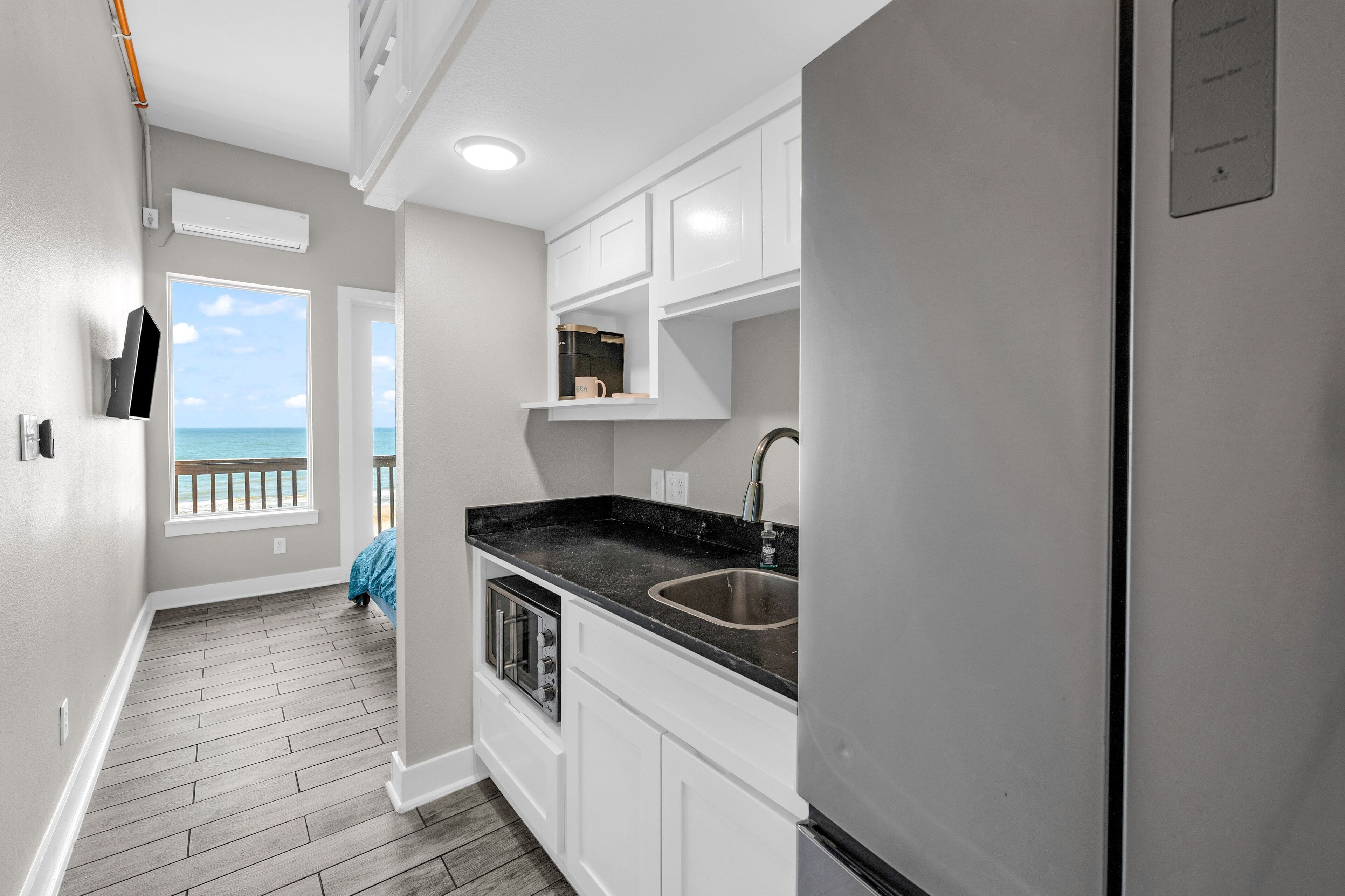 Fridge, microwave, coffee/tea maker, toaster