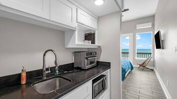 Fridge, microwave, coffee/tea maker, toaster